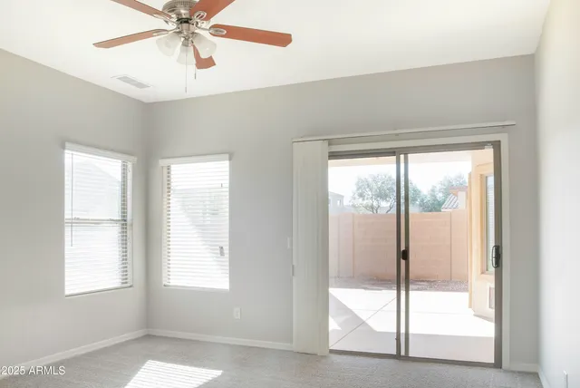 a view of an empty room and window