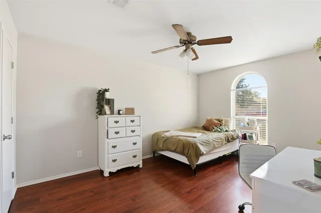 a room with a bed and a window