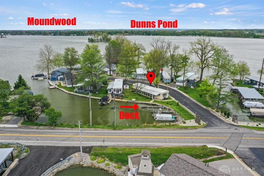 246 North Orchard Island Road Russells Point, OH 43348 - Photo 30 of 43 This serene waterfront property offers direct access to the lake, perfect for leisure and outdoor activities.