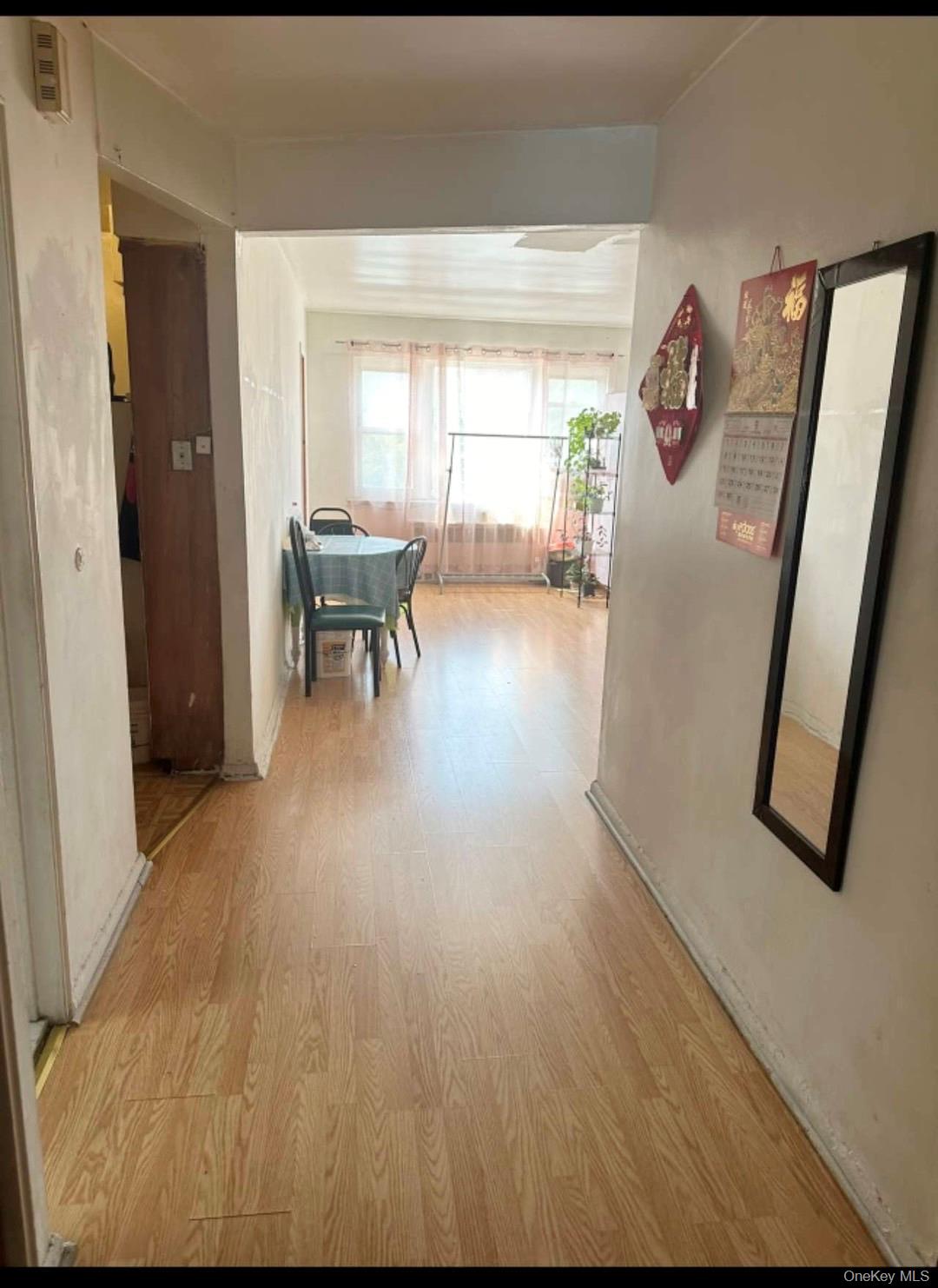 153-51 Horace Harding Expressway Queens, NY 11367 - Photo 5 of 11 Hallway with wood finished floors