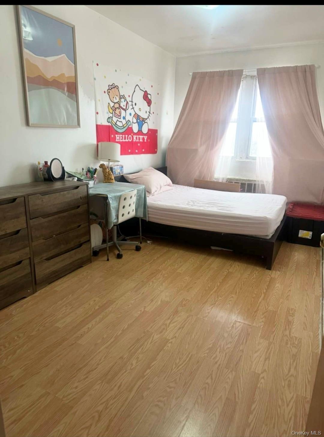153-51 Horace Harding Expressway Queens, NY 11367 - Photo 6 of 11 Bedroom featuring light wood-style flooring