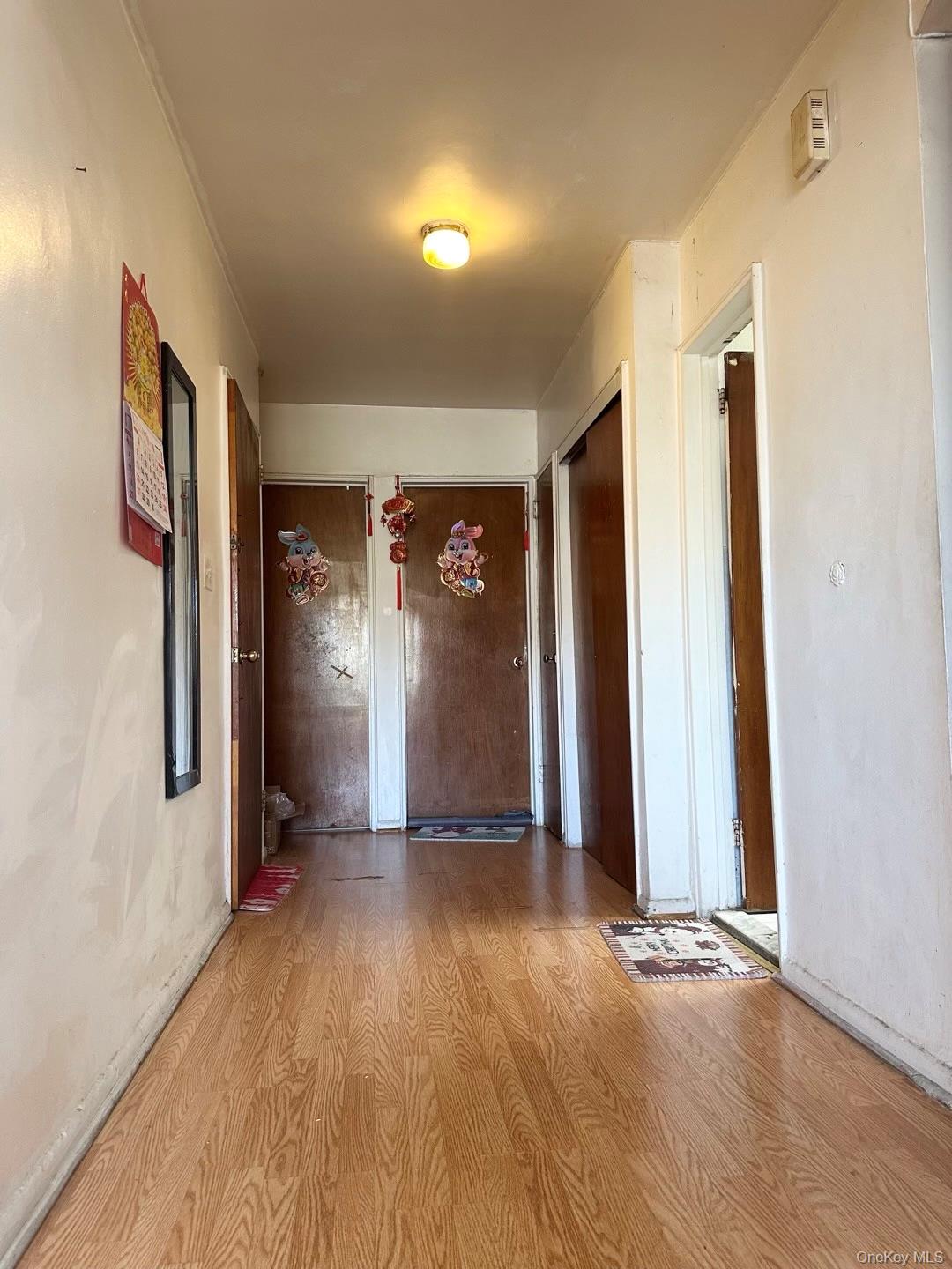 153-51 Horace Harding Expressway Queens, NY 11367 - Photo 8 of 11 Corridor with wood finished floors