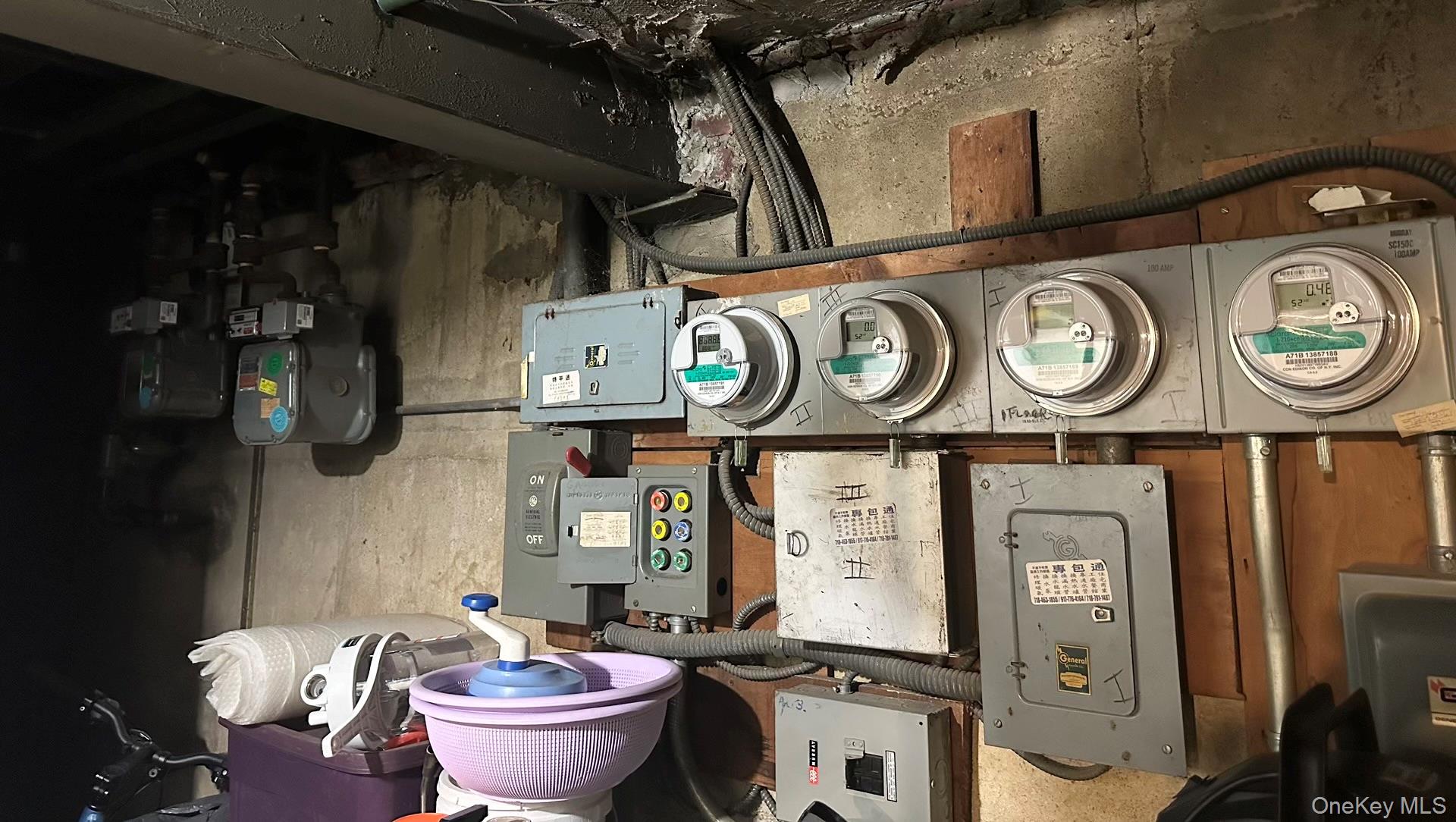 153-51 Horace Harding Expressway Queens, NY 11367 - Photo 10 of 11 Utility room featuring electric panel