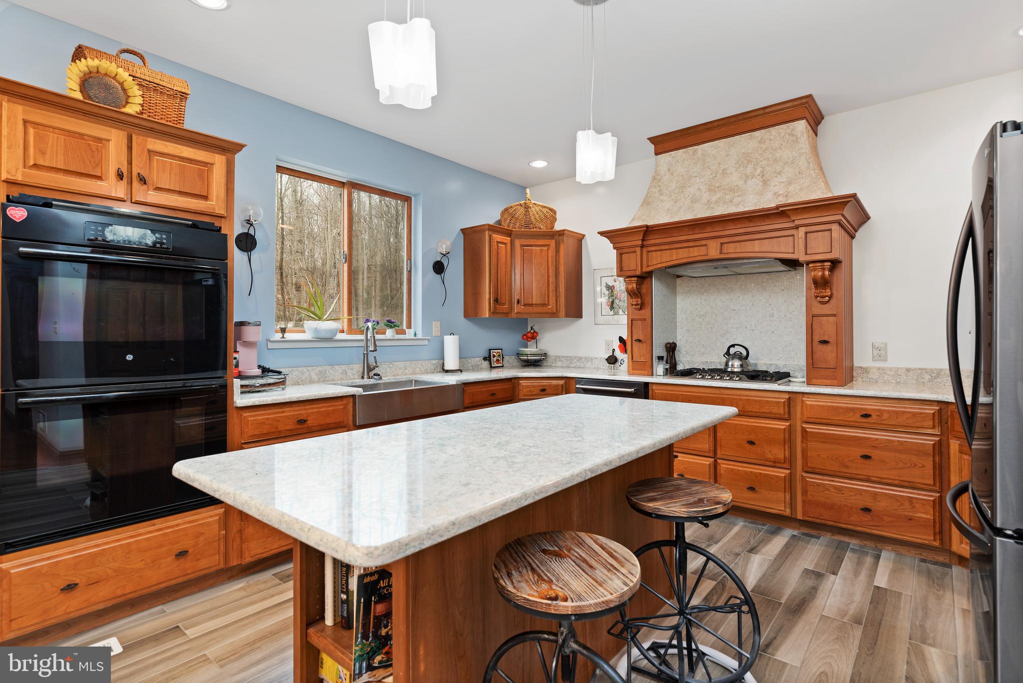 1370 Indian Peg Road Boiling Springs, PA 17007 - Photo 17 of 44 Stools included. Propane cooking & dbl wall ovens!