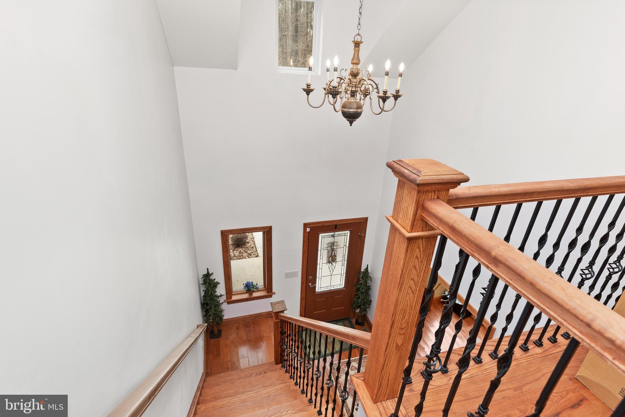 1370 Indian Peg Road Boiling Springs, PA 17007 - Photo 25 of 44 Solid wood staircase leads to 2nd level