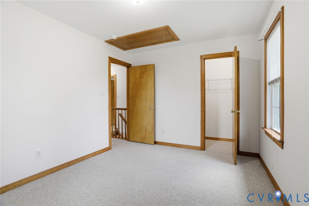 14420 Branding Iron Road Chesterfield, VA 23838 - Photo 35 of 50 Carpeted room with white walls, featuring a window