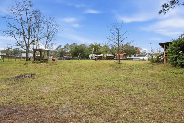 a view of a patio with wooden floor