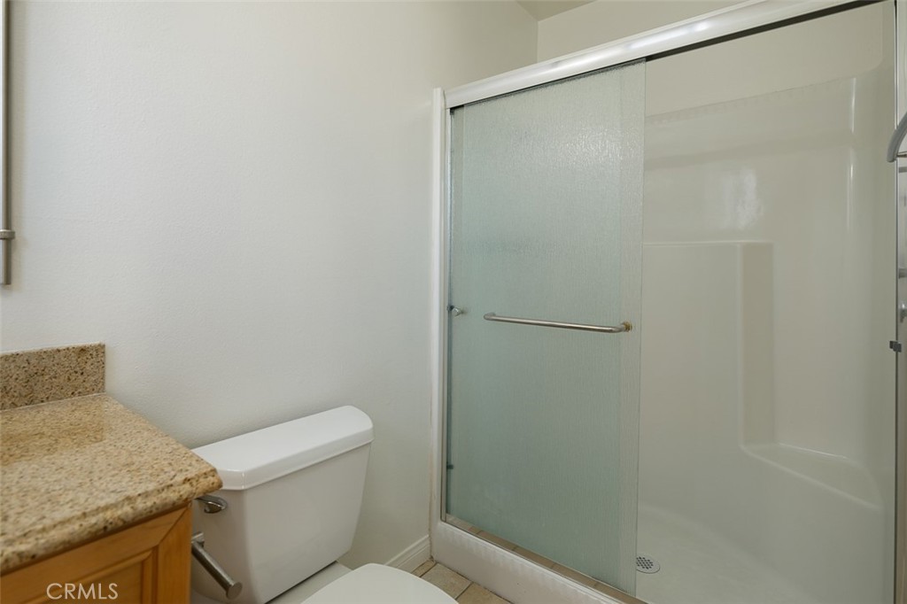 9716 Loftus Drive Rosemead, CA 91770 - Photo 18 of 28 a white toilet sitting next to a shower