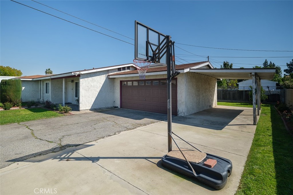 9716 Loftus Drive Rosemead, CA 91770 - Photo 27 of 28 a front view of a house with garage