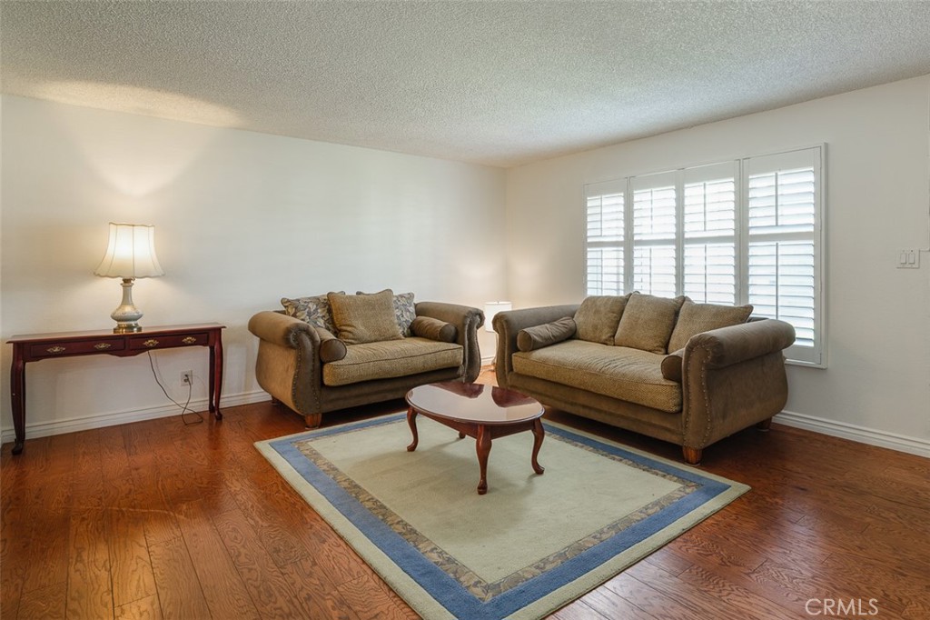 9716 Loftus Drive Rosemead, CA 91770 - Photo 7 of 28 a living room with furniture and a coffee table