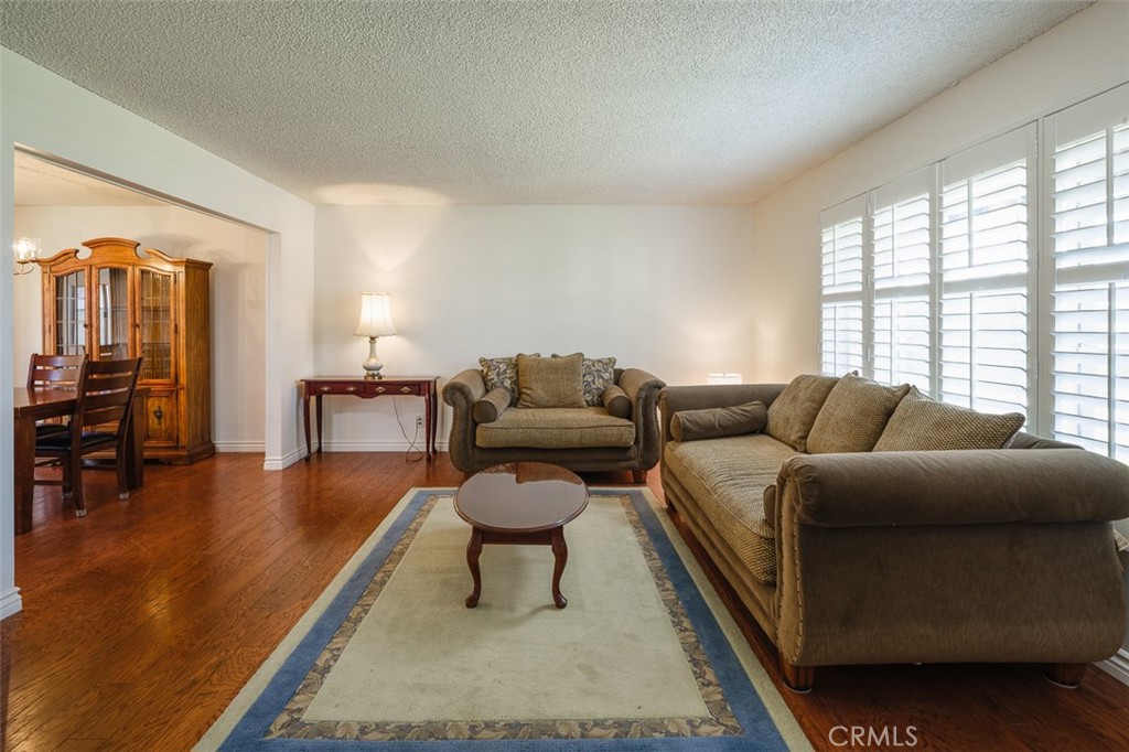 9716 Loftus Drive Rosemead, CA 91770 - Photo 8 of 28 a living room with furniture and a large window