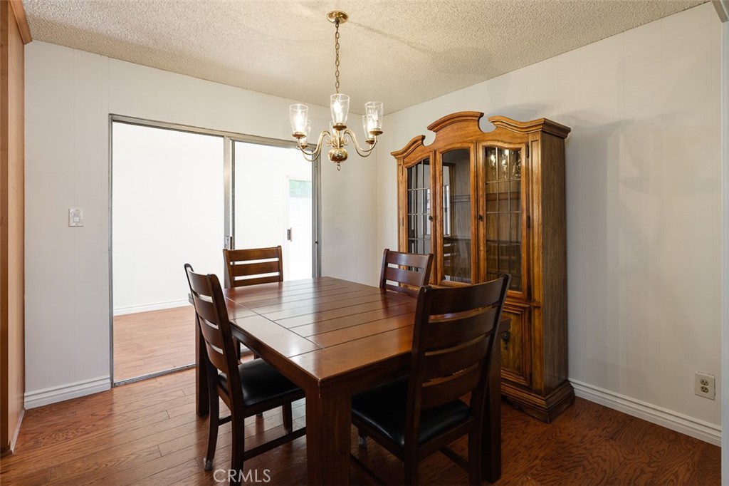 9716 Loftus Drive Rosemead, CA 91770 - Photo 9 of 28 a view of a dining room with furniture window and wooden floor