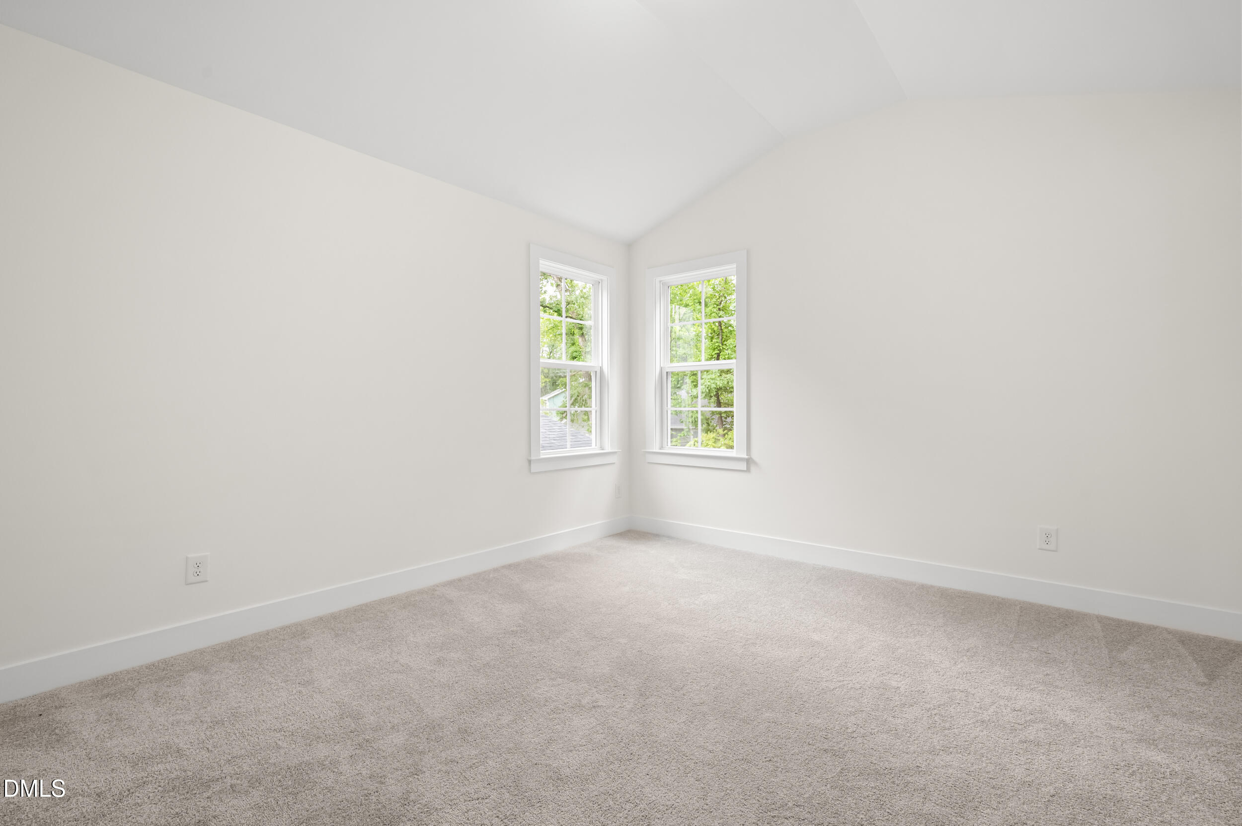 708 Grayhaven Place Raleigh, NC 27606 - Photo 25 of 33 an empty room with windows
