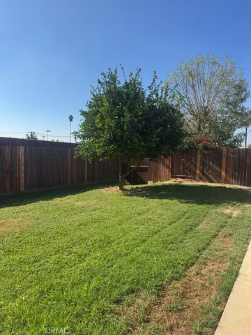 a view of a backyard with a garden