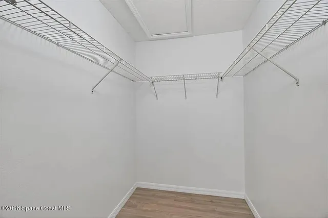 a view of a room with racks on the wall