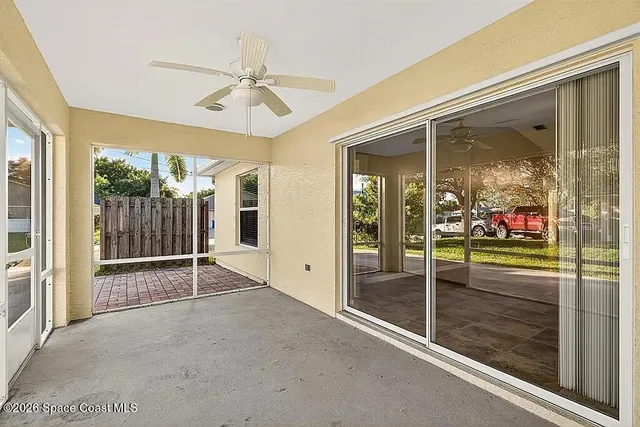 a view of an entryway with a front door