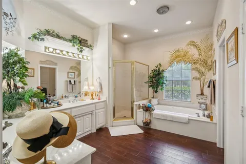 a view of a livingroom with furniture and staircase