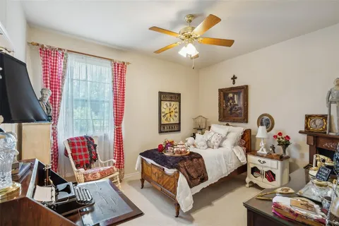 a view of a backyard with sitting area and furniture