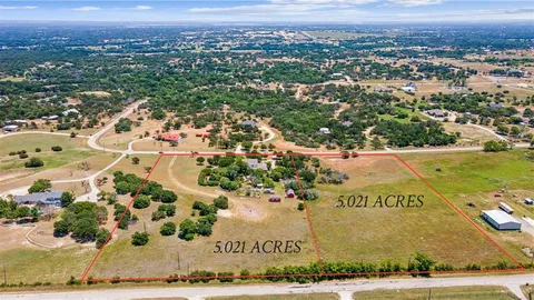 a view of a town with an ocean view