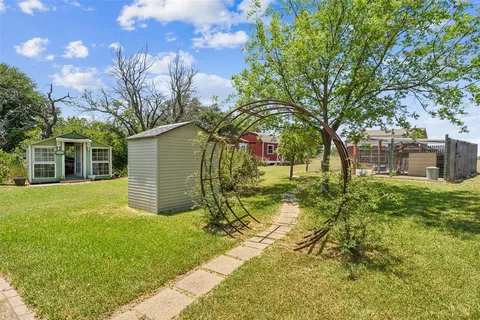 a house view with garden space