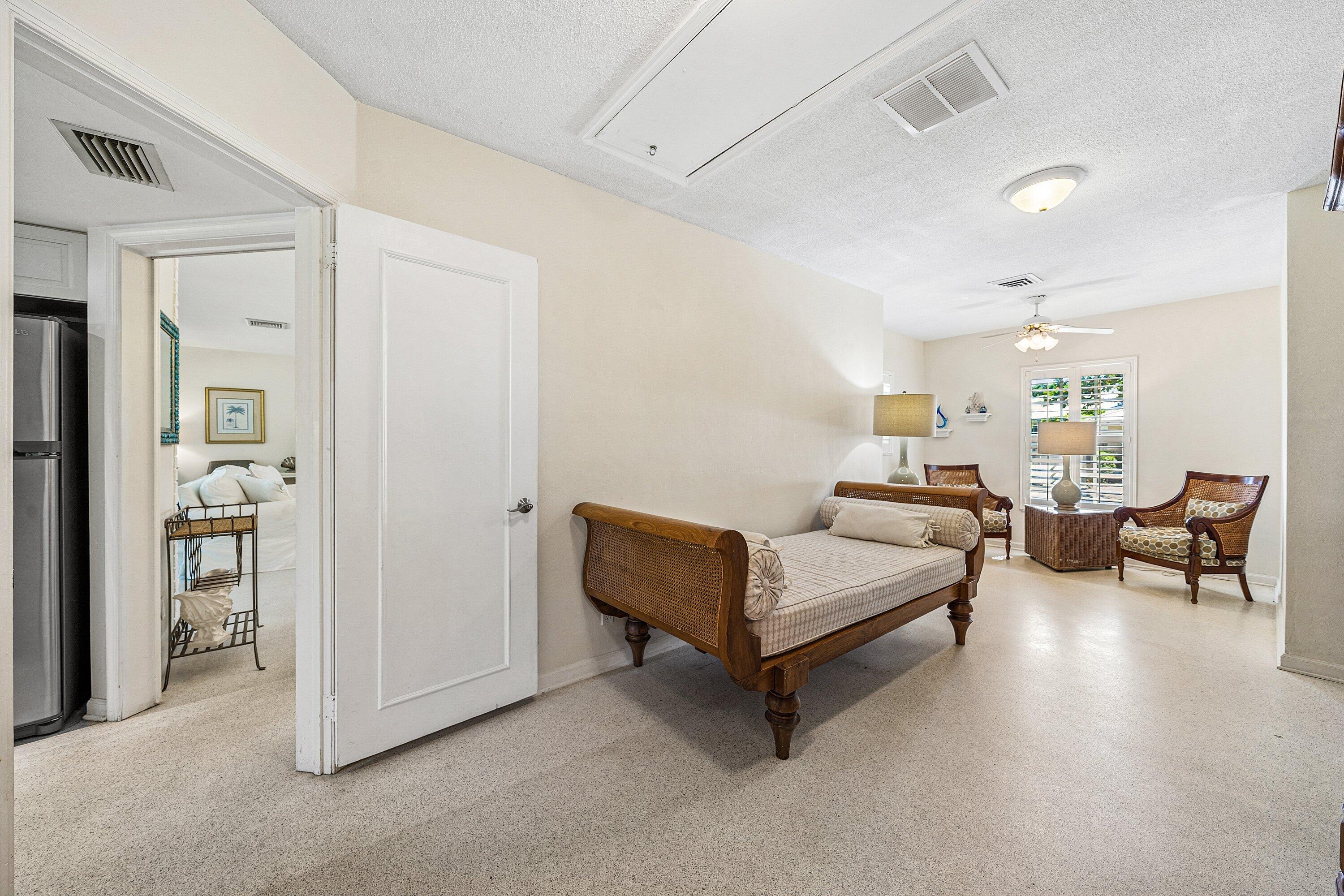 5550 Osprey Drive Ocean Ridge, FL 33435 - Photo 22 of 44 a living room with furniture and a table