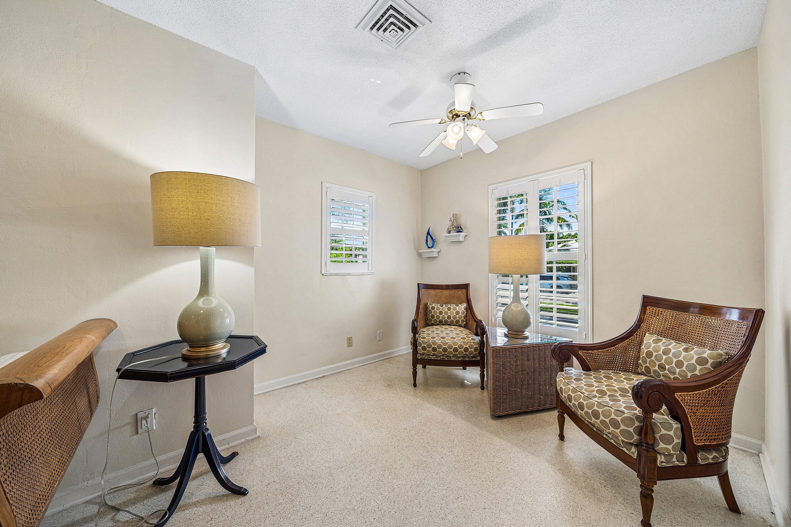 5550 Osprey Drive Ocean Ridge, FL 33435 - Photo 23 of 44 a living room with furniture and a window
