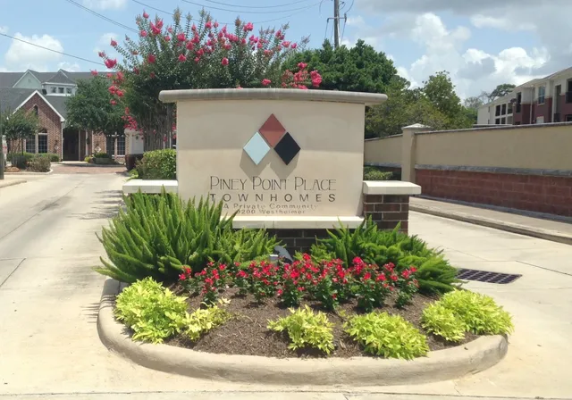 a picture of a room with a table and a chandelier