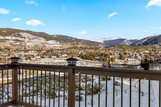 a view of a balcony with an ocean view