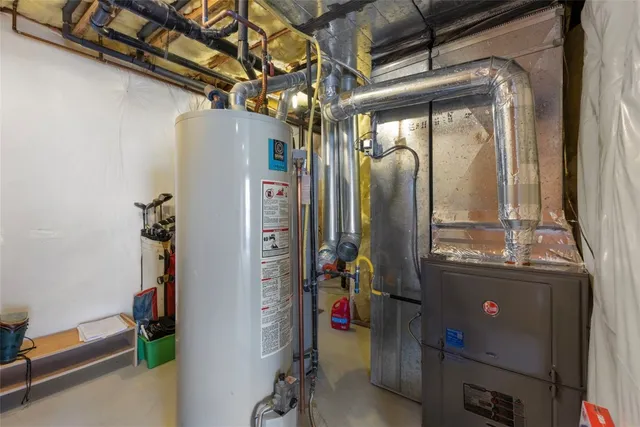 a view of a chairs and table in a room