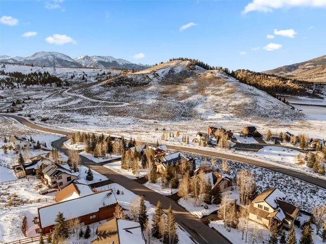 a view of a city with mountains in the background