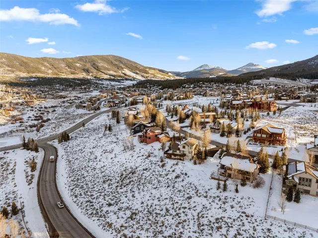 a view of an ocean and a mountain