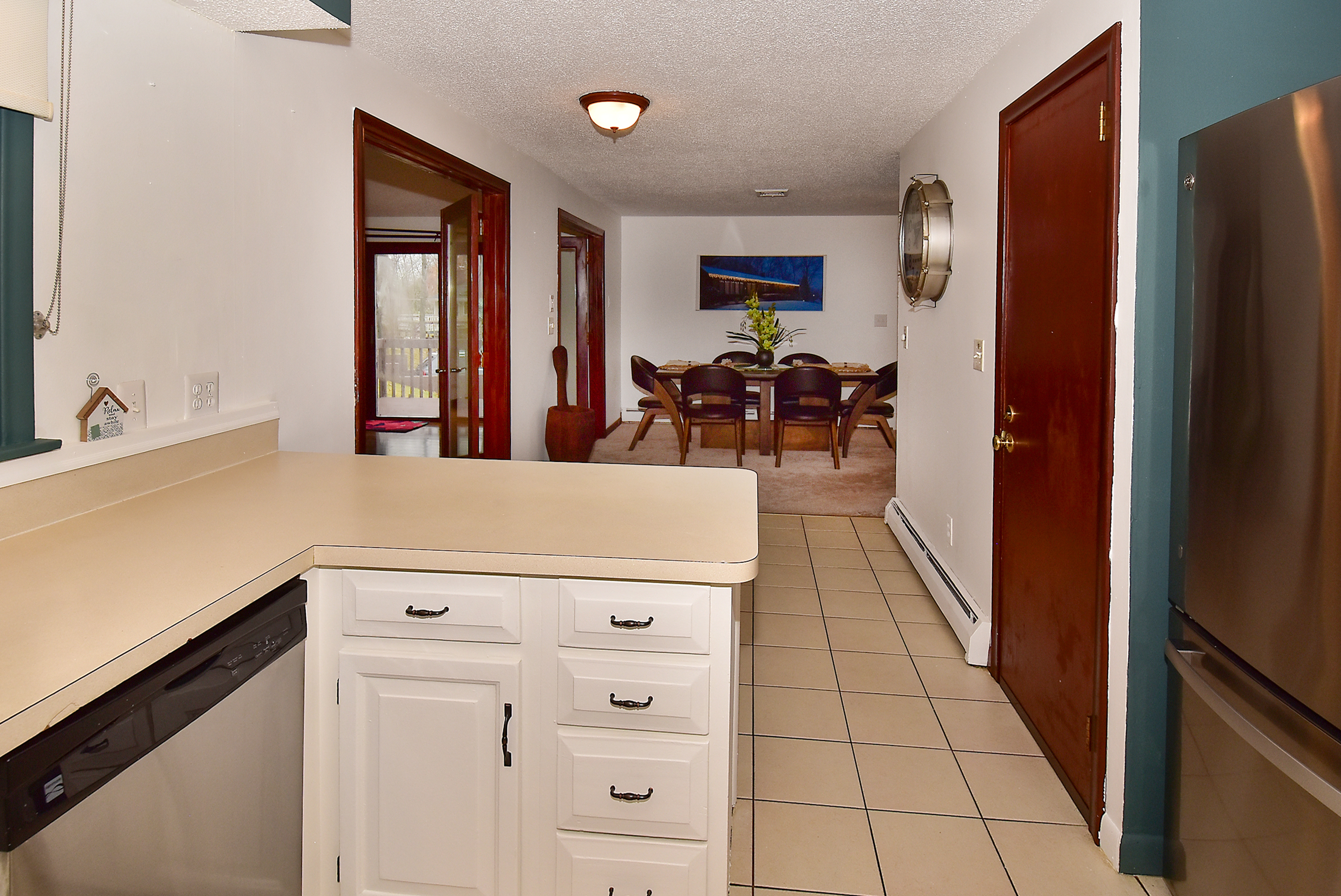 12 Austin Drive Vernon, CT 06066 - Photo 15 of 33 a kitchen with stainless steel appliances a refrigerator and a stove