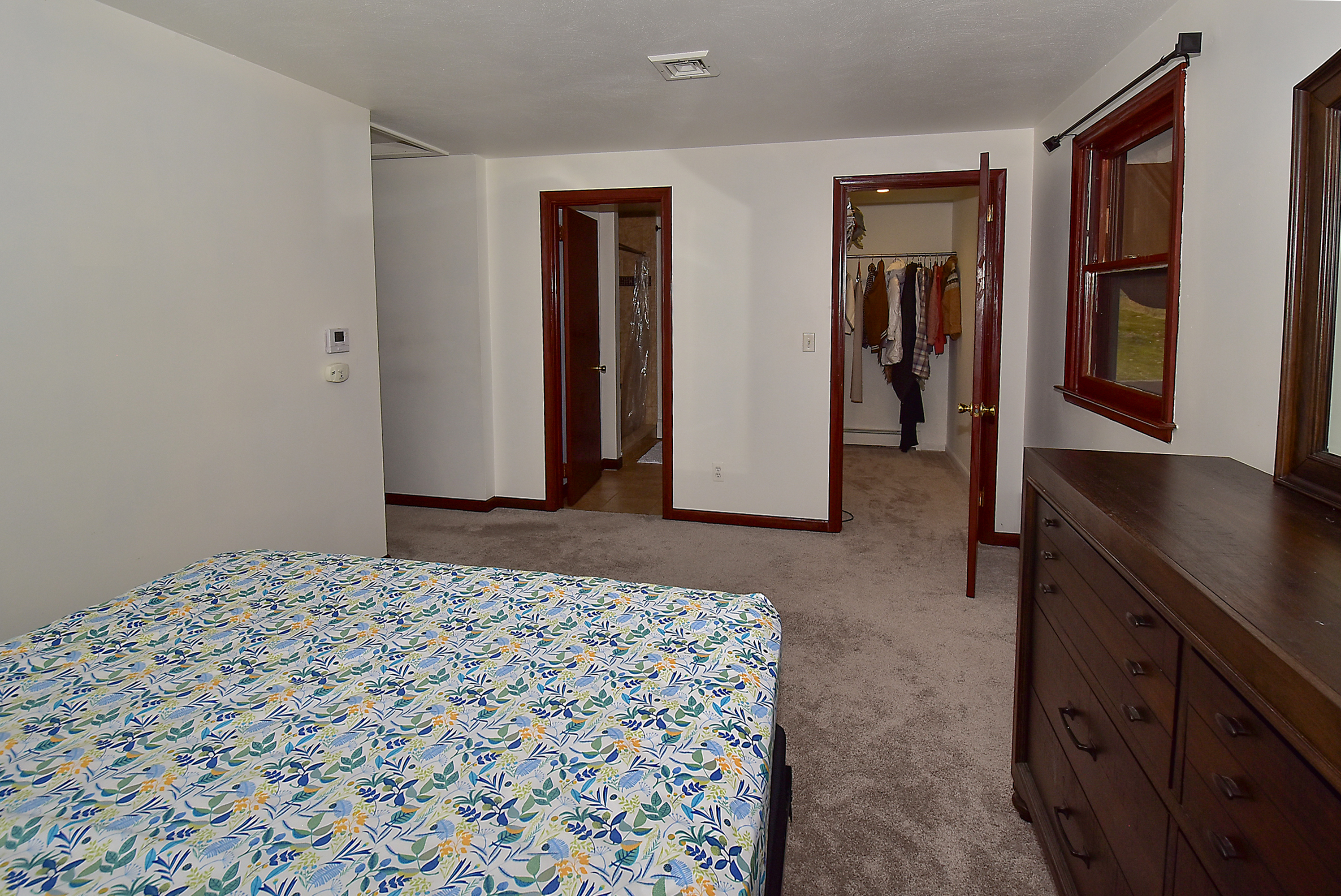 12 Austin Drive Vernon, CT 06066 - Photo 20 of 33 a bedroom with a bed and a dresser