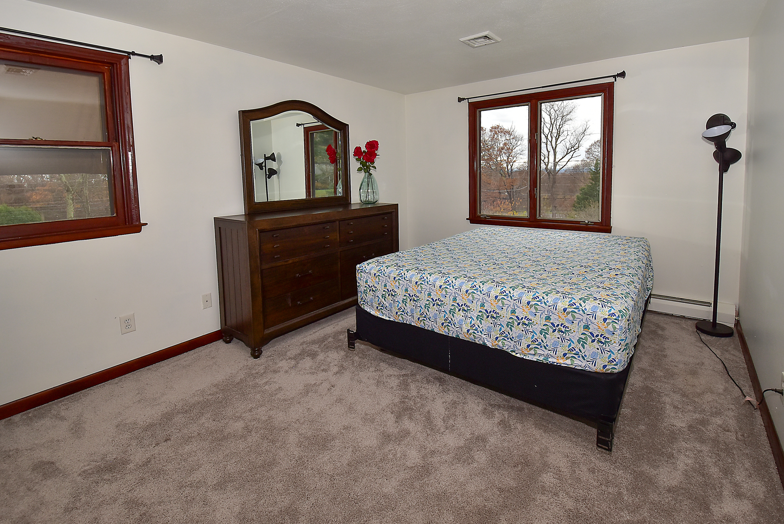 12 Austin Drive Vernon, CT 06066 - Photo 21 of 33 a bed sitting in a bedroom next to a window