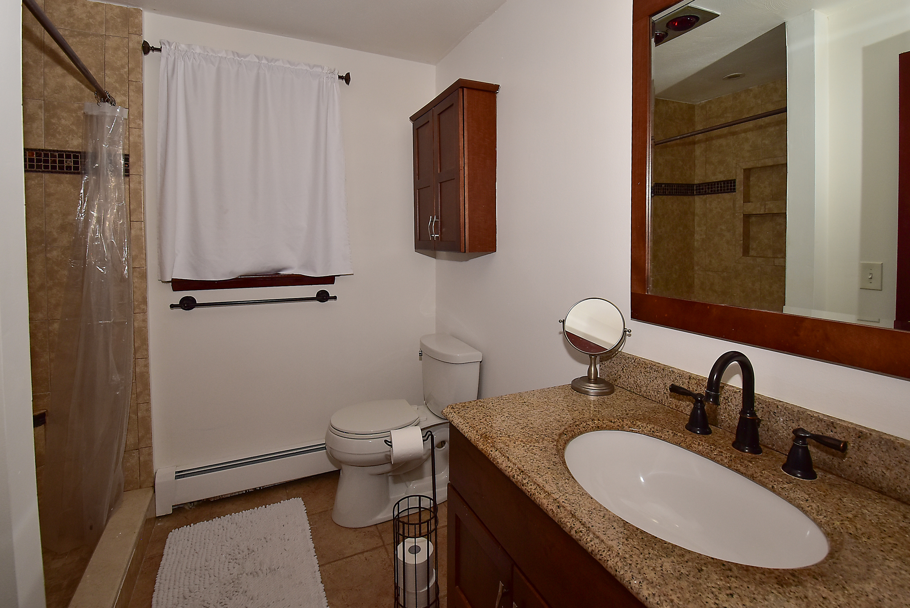 12 Austin Drive Vernon, CT 06066 - Photo 22 of 33 a bathroom with a granite countertop sink toilet and mirror