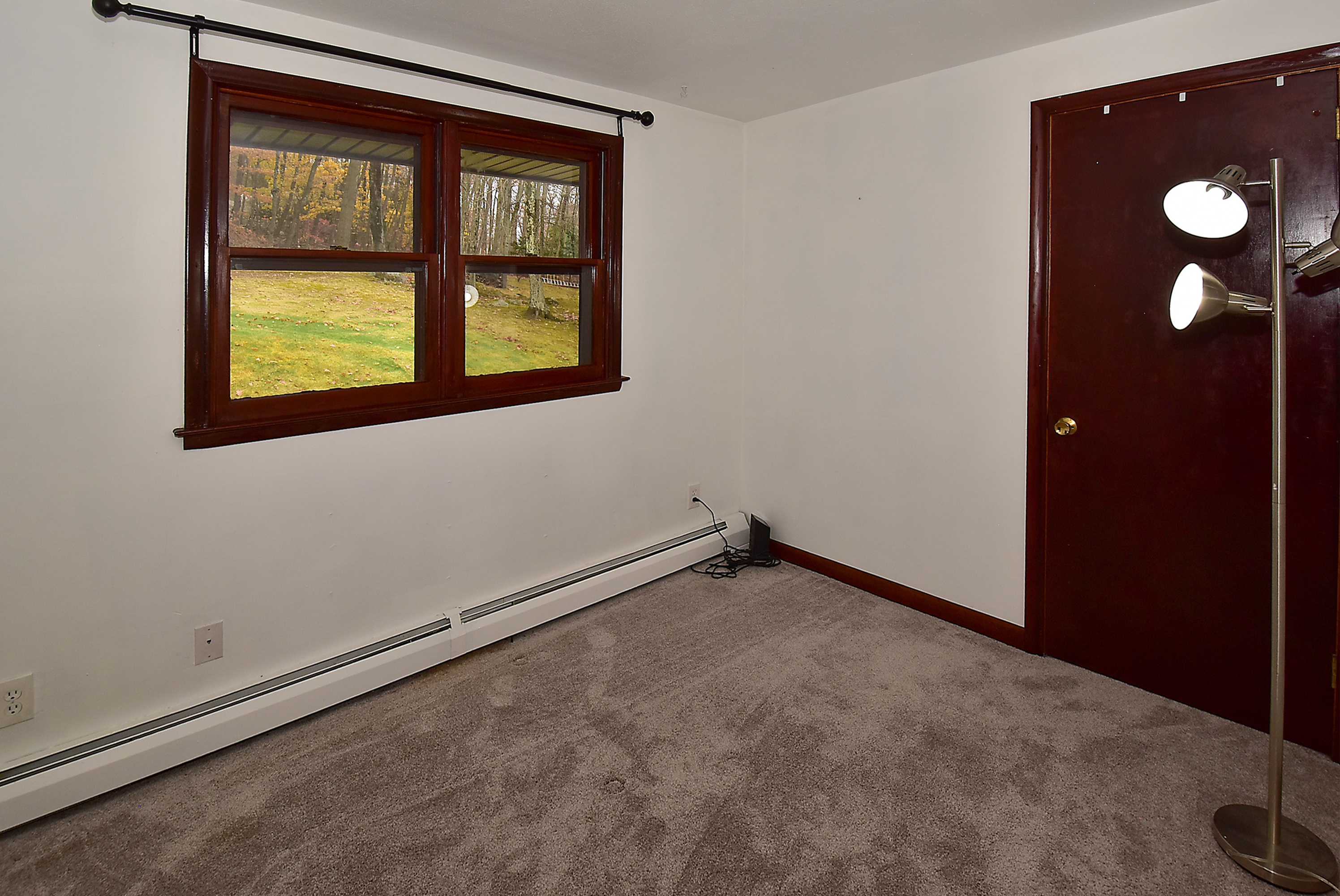 12 Austin Drive Vernon, CT 06066 - Photo 25 of 33 a view of an empty room with a window