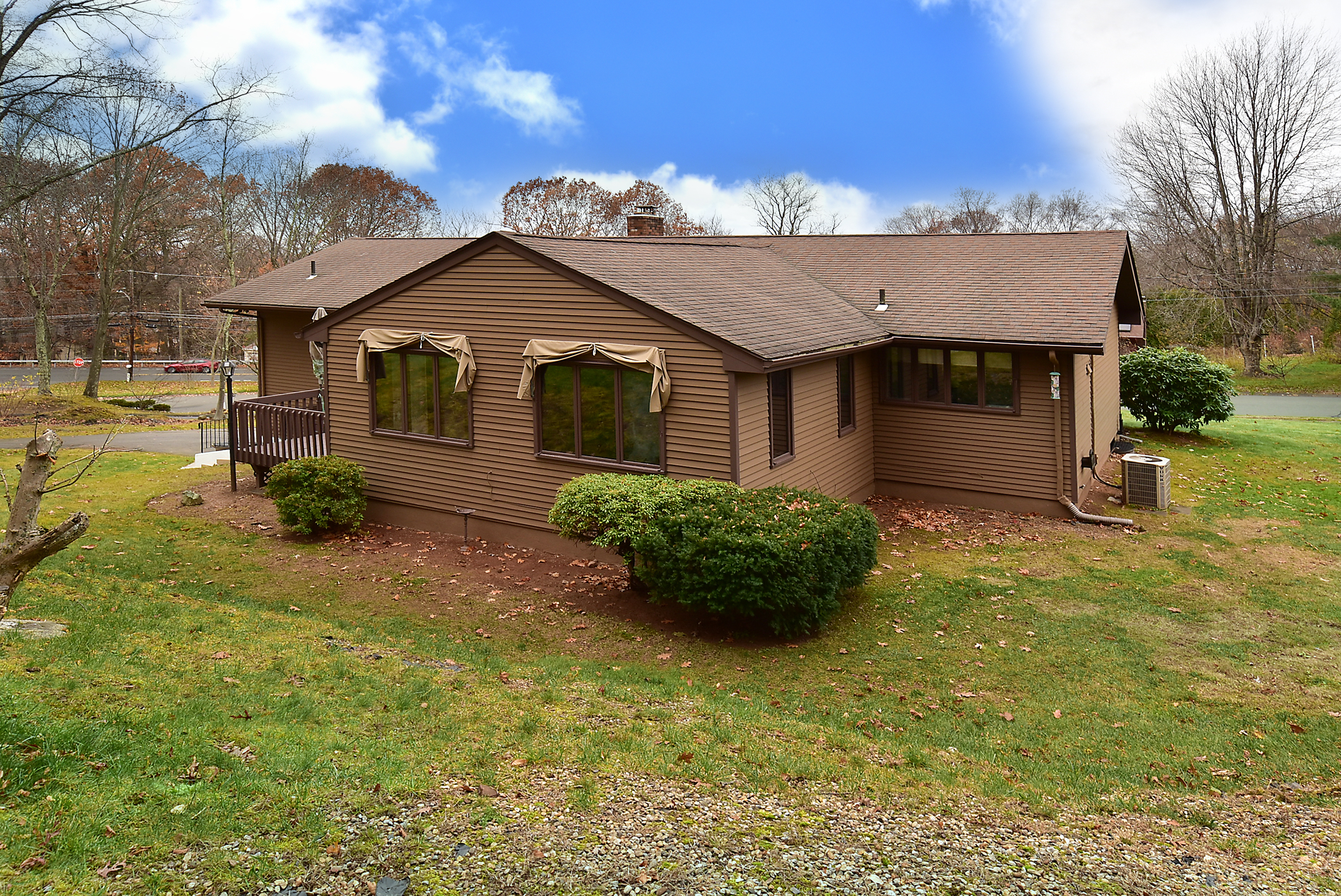 12 Austin Drive Vernon, CT 06066 - Photo 32 of 33 a front view of a house with garden