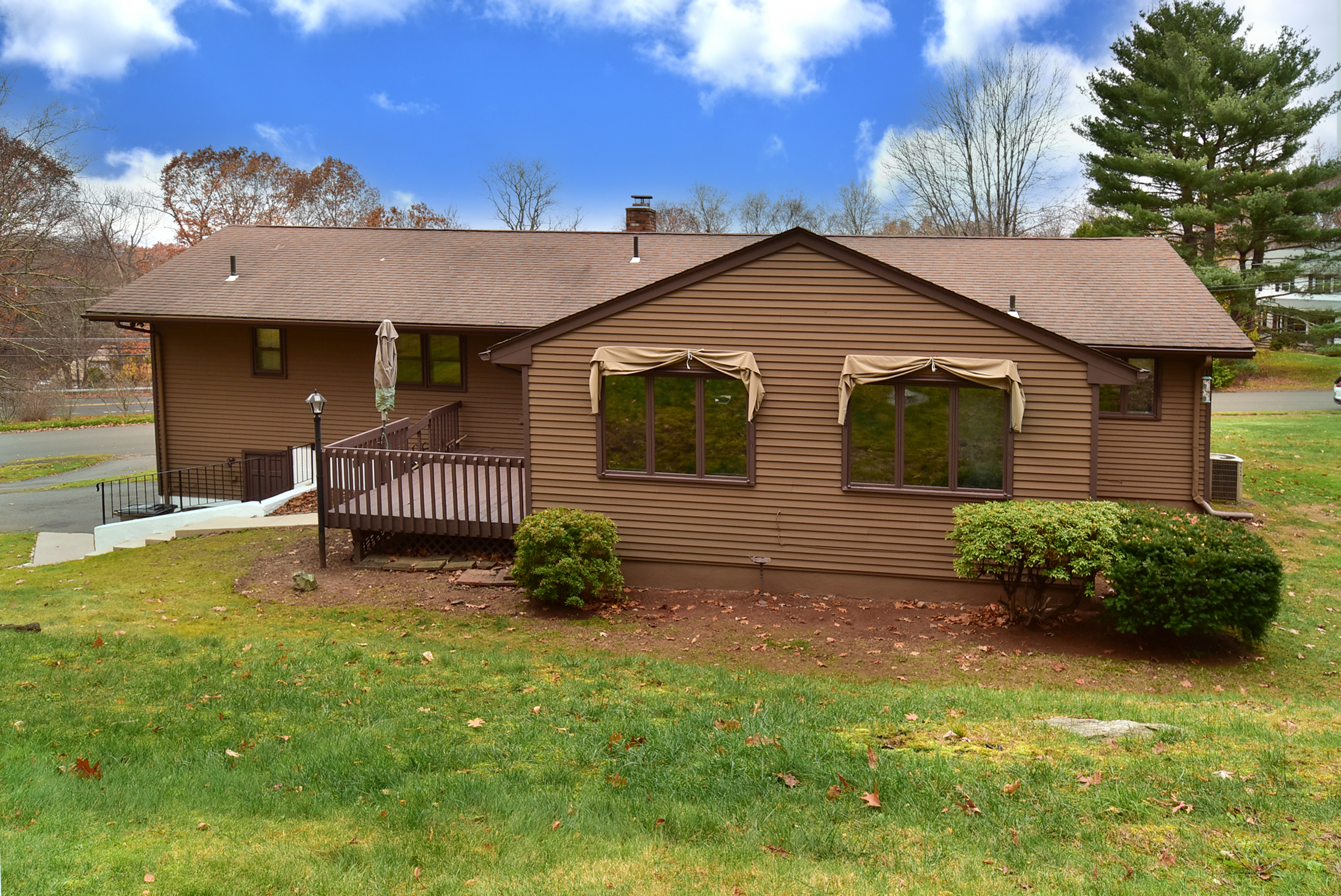 12 Austin Drive Vernon, CT 06066 - Photo 33 of 33 a backyard of a house with table and chairs