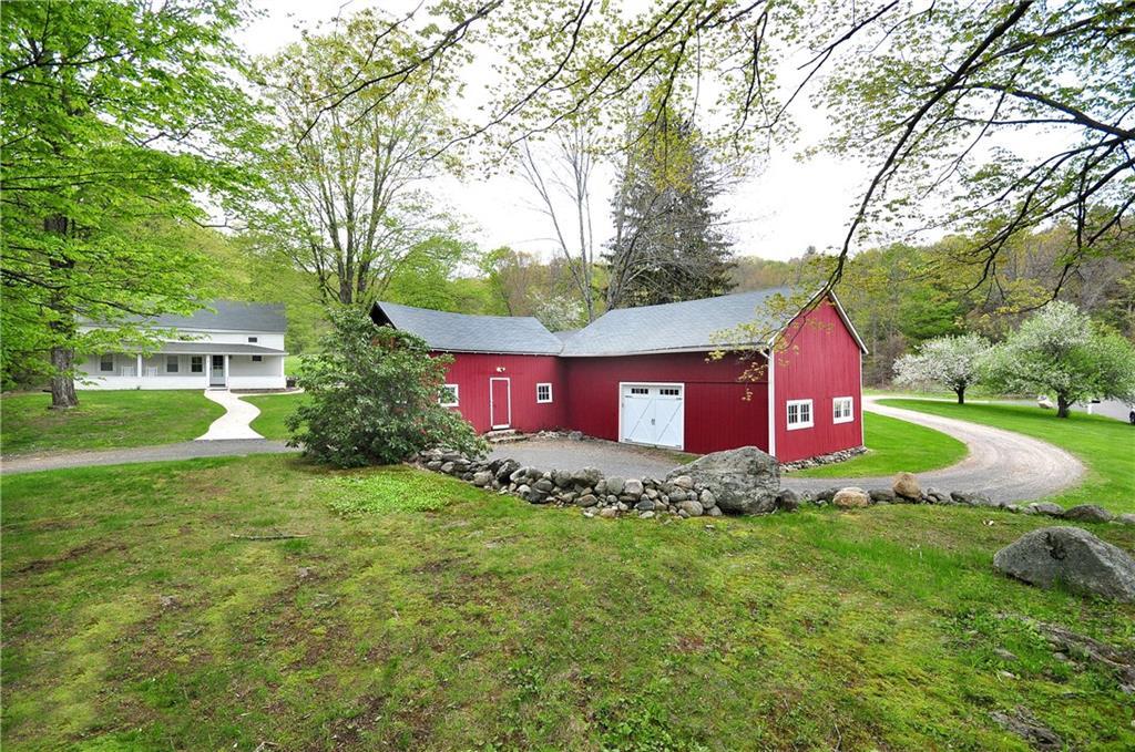 72 Barkhamsted Road Granby, CT 06090 - Photo 1 of 1 a view of a yard with large trees