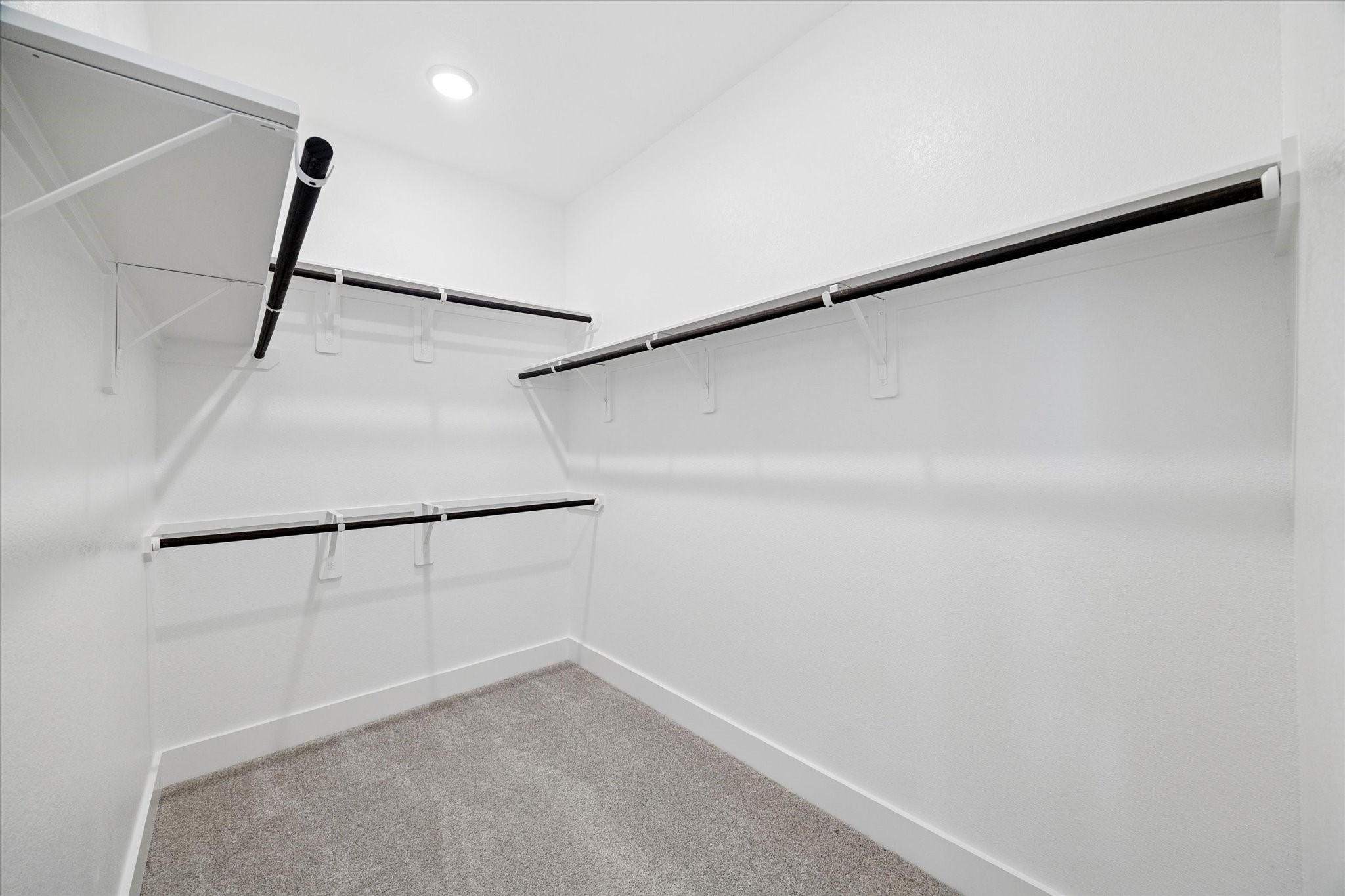 31435 Beacon Cove Trail Fulshear, TX 77441 - Photo 19 of 35 a view of an empty walk in closet