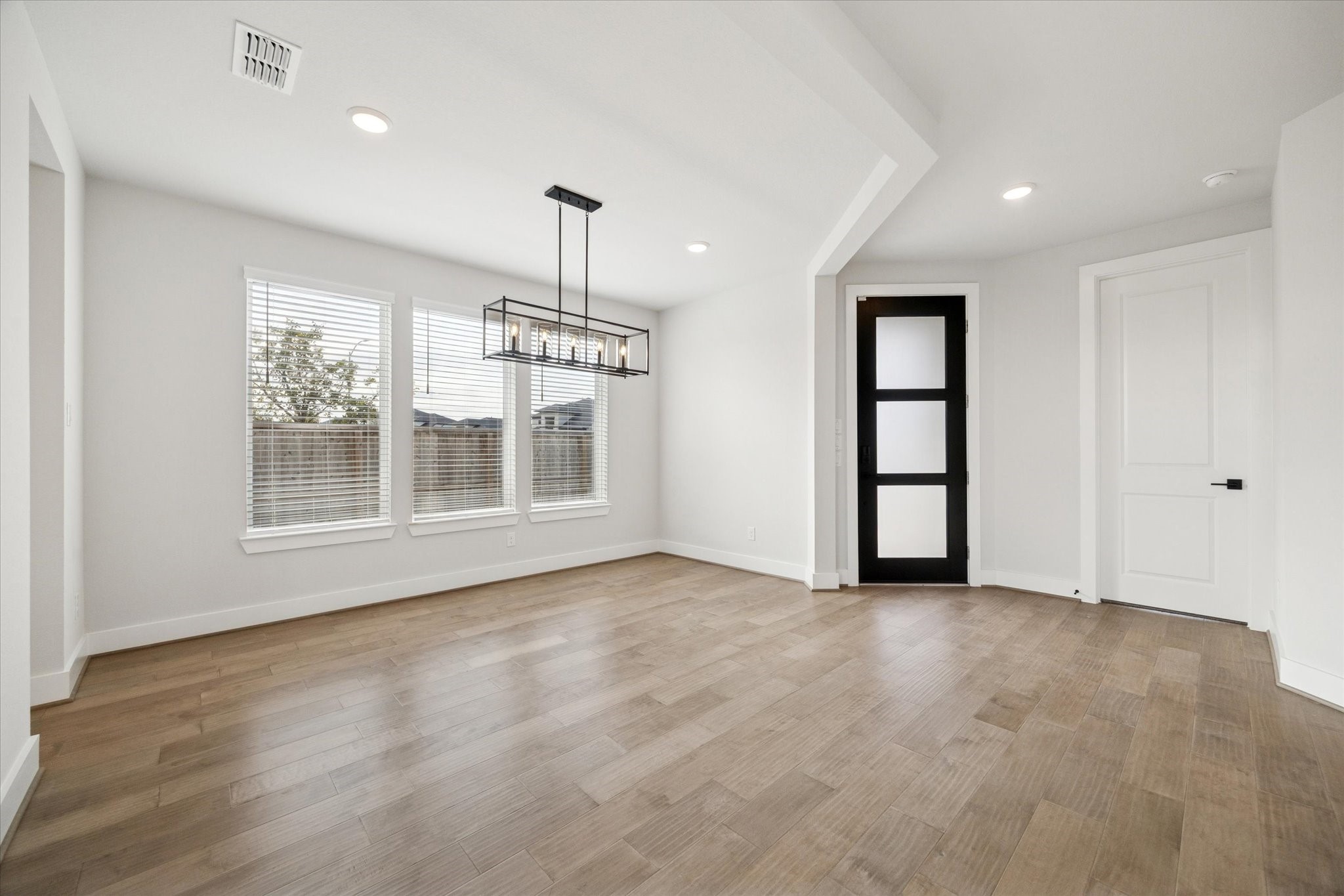 31435 Beacon Cove Trail Fulshear, TX 77441 - Photo 5 of 35 a view of an empty room with a window