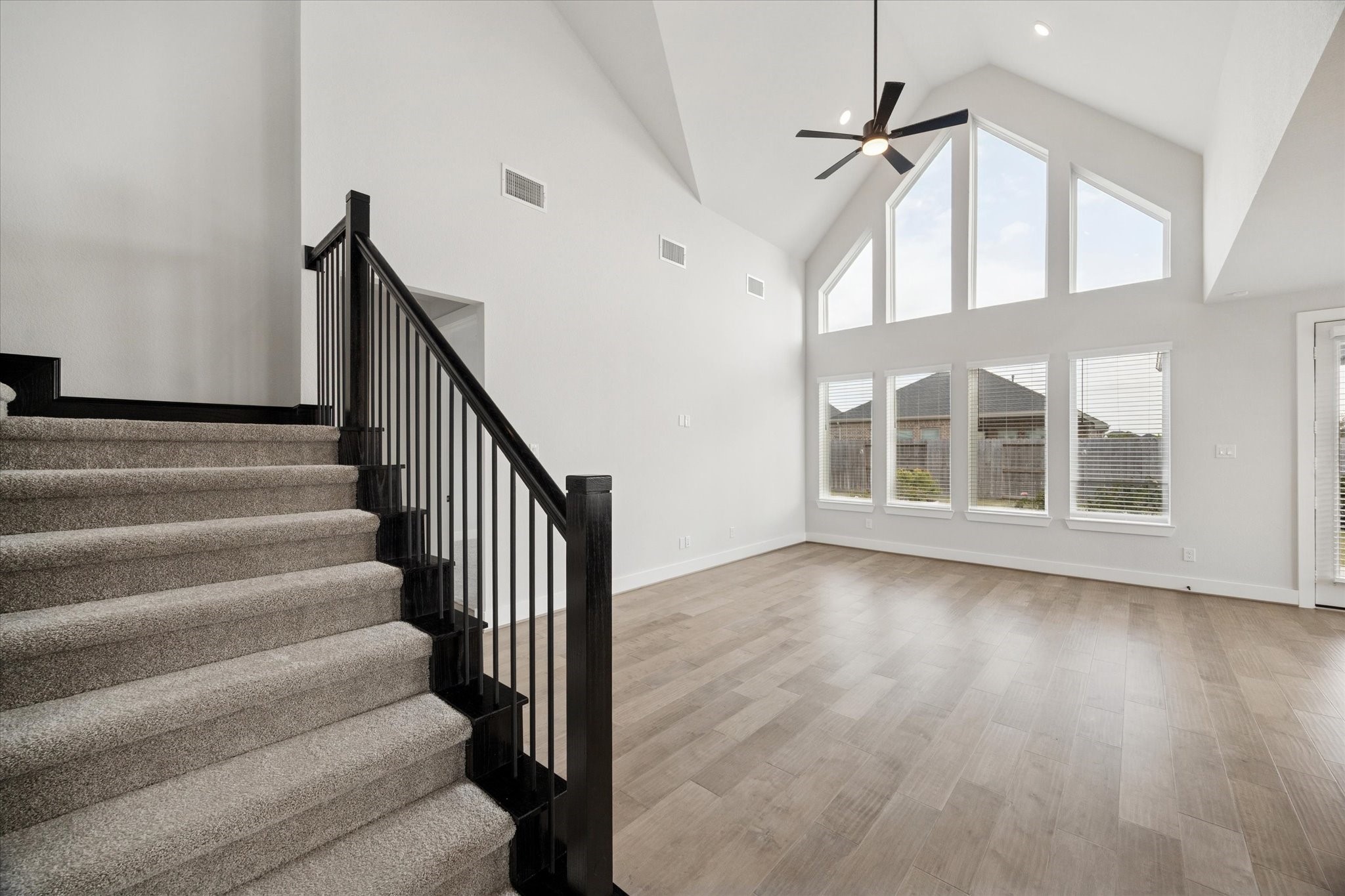 31435 Beacon Cove Trail Fulshear, TX 77441 - Photo 7 of 35 a view of an entryway with wooden floor