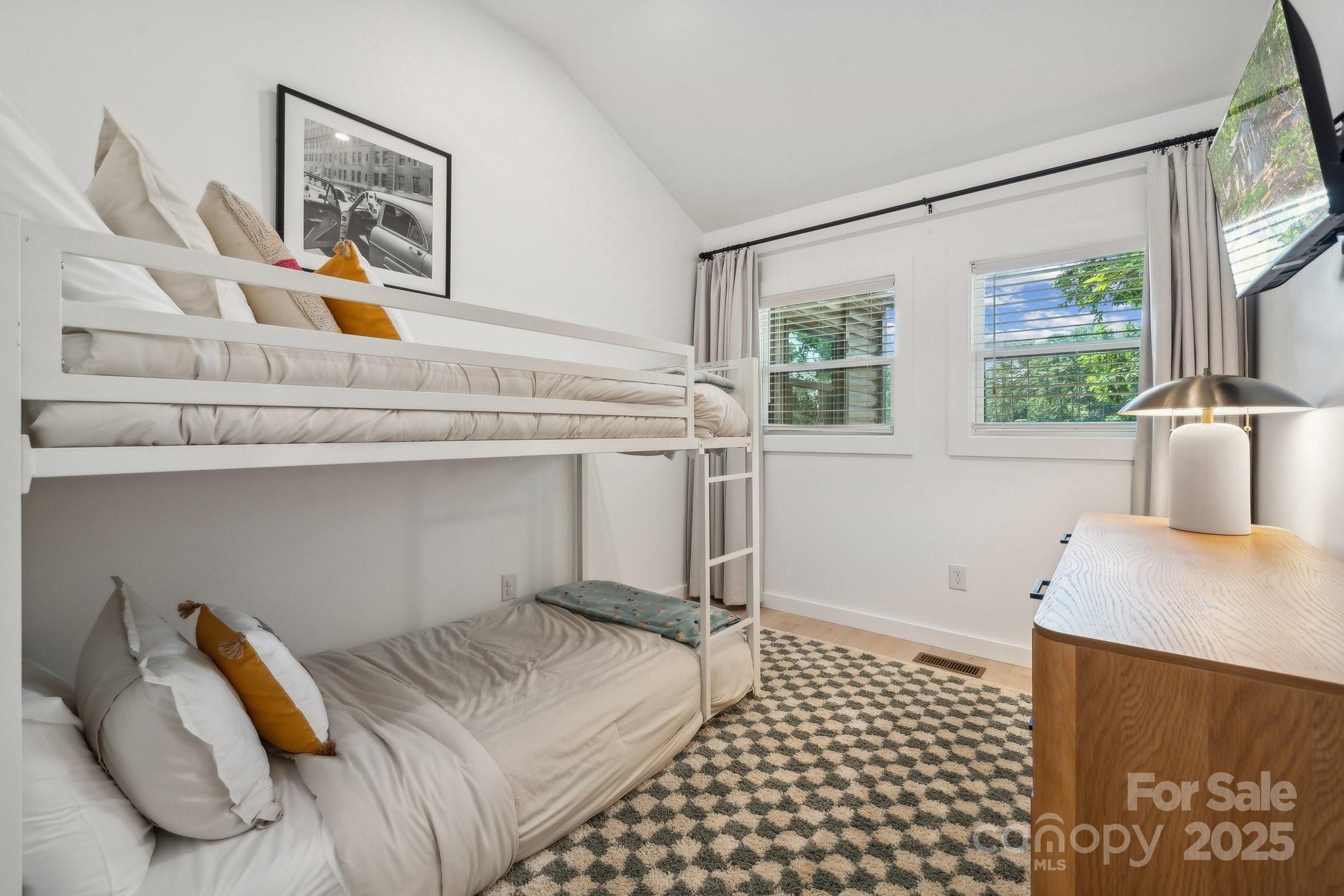 254 South Fork Road Mooresville, NC 28117 - Photo 13 of 34 a bedroom with a bed and wooden floor