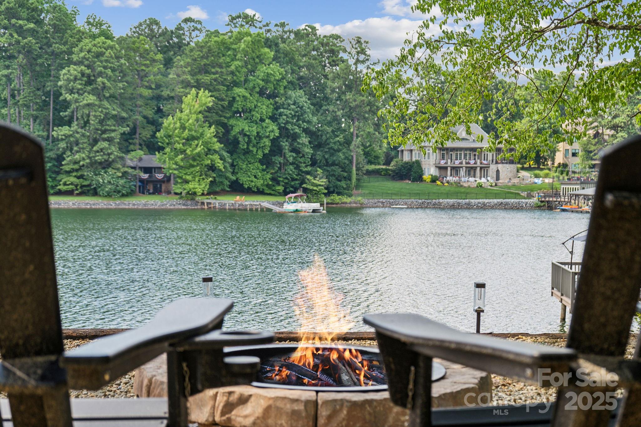 254 South Fork Road Mooresville, NC 28117 - Photo 15 of 34 a view of a lake from a balcony with outdoor seating