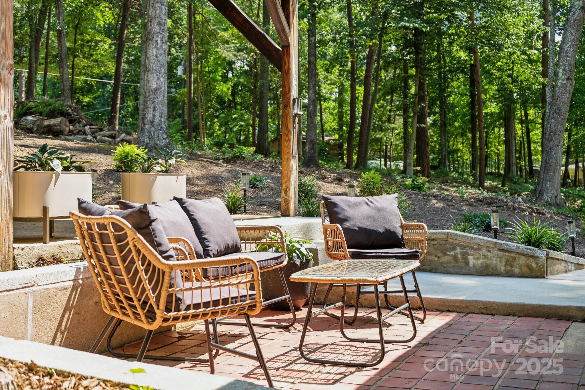 254 South Fork Road Mooresville, NC 28117 - Photo 16 of 34 a view of a patio with a dining table and chairs with wooden floor