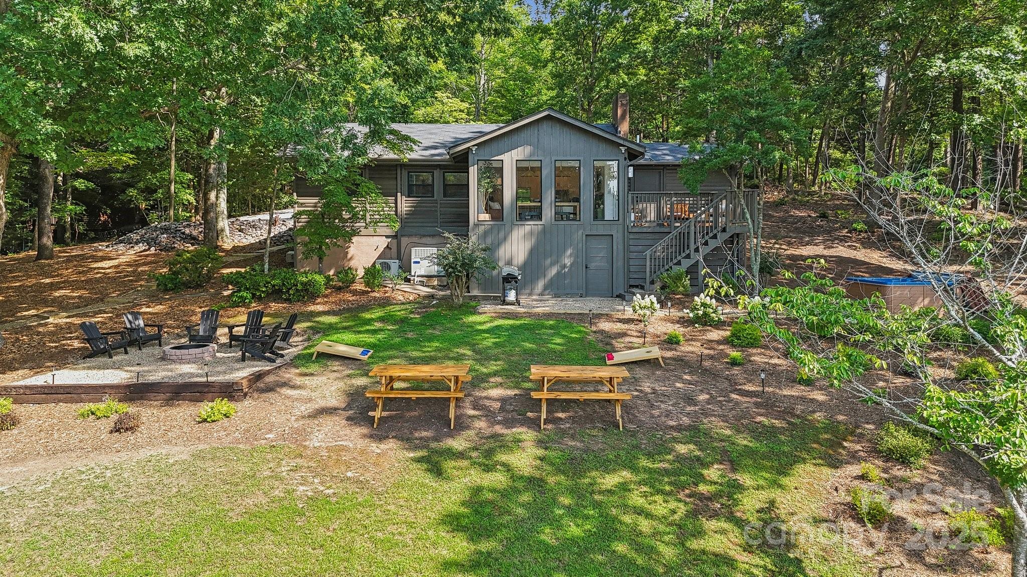 254 South Fork Road Mooresville, NC 28117 - Photo 28 of 34 a view of a chair and table in backyard of the house