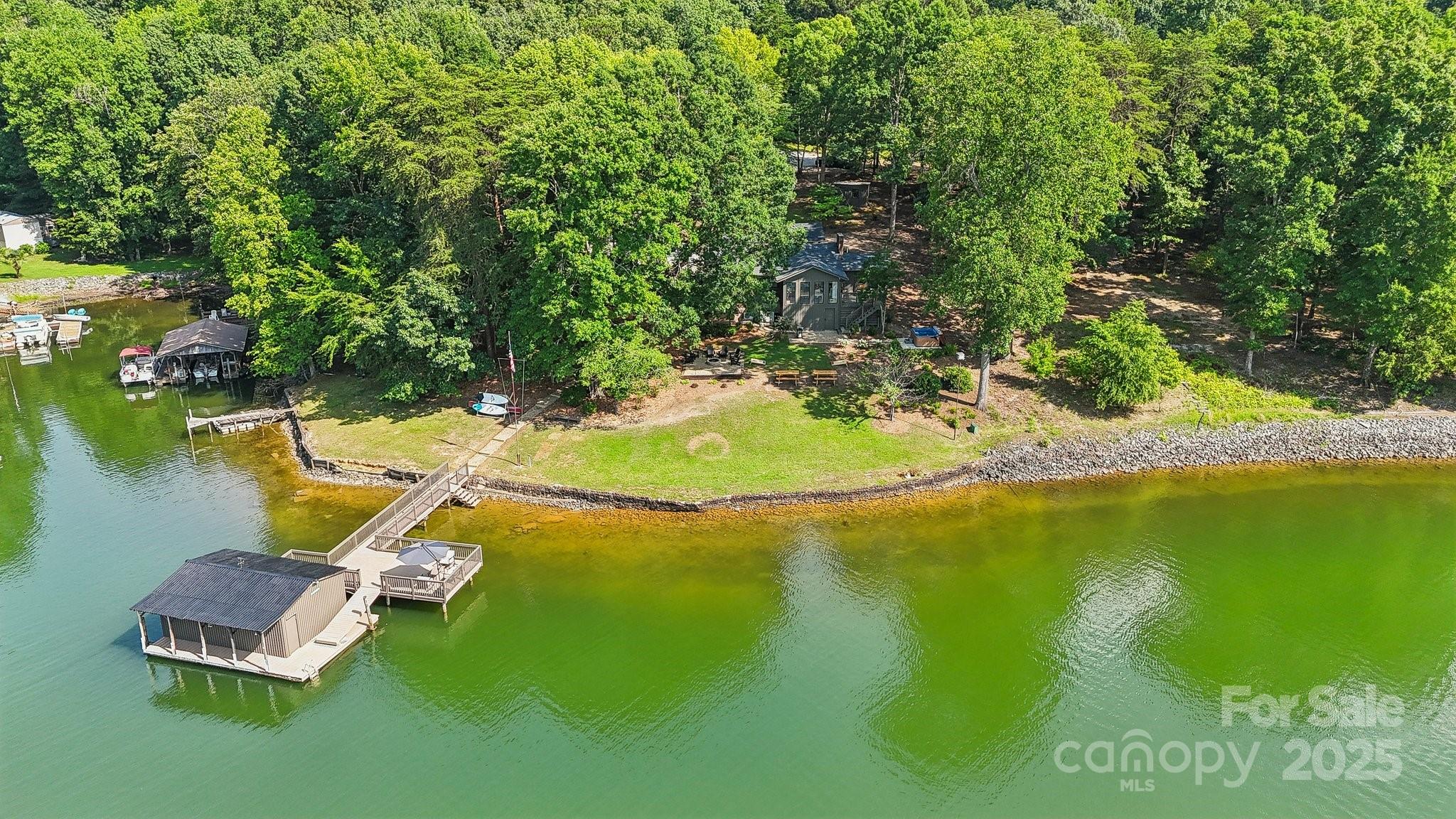 254 South Fork Road Mooresville, NC 28117 - Photo 31 of 34 a view of a lake with a yard