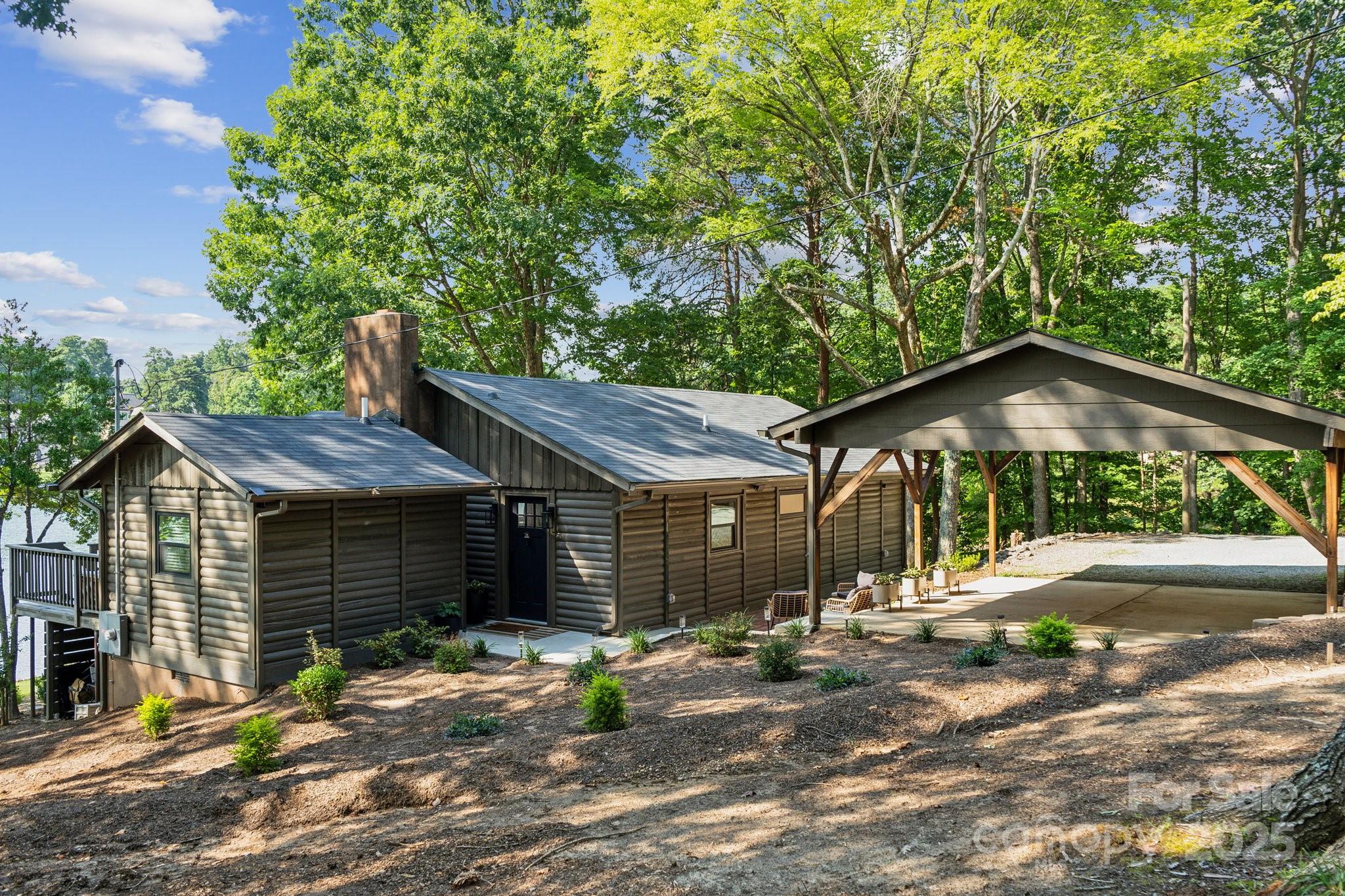 254 South Fork Road Mooresville, NC 28117 - Photo 33 of 34 a front view of a house with a yard and tree