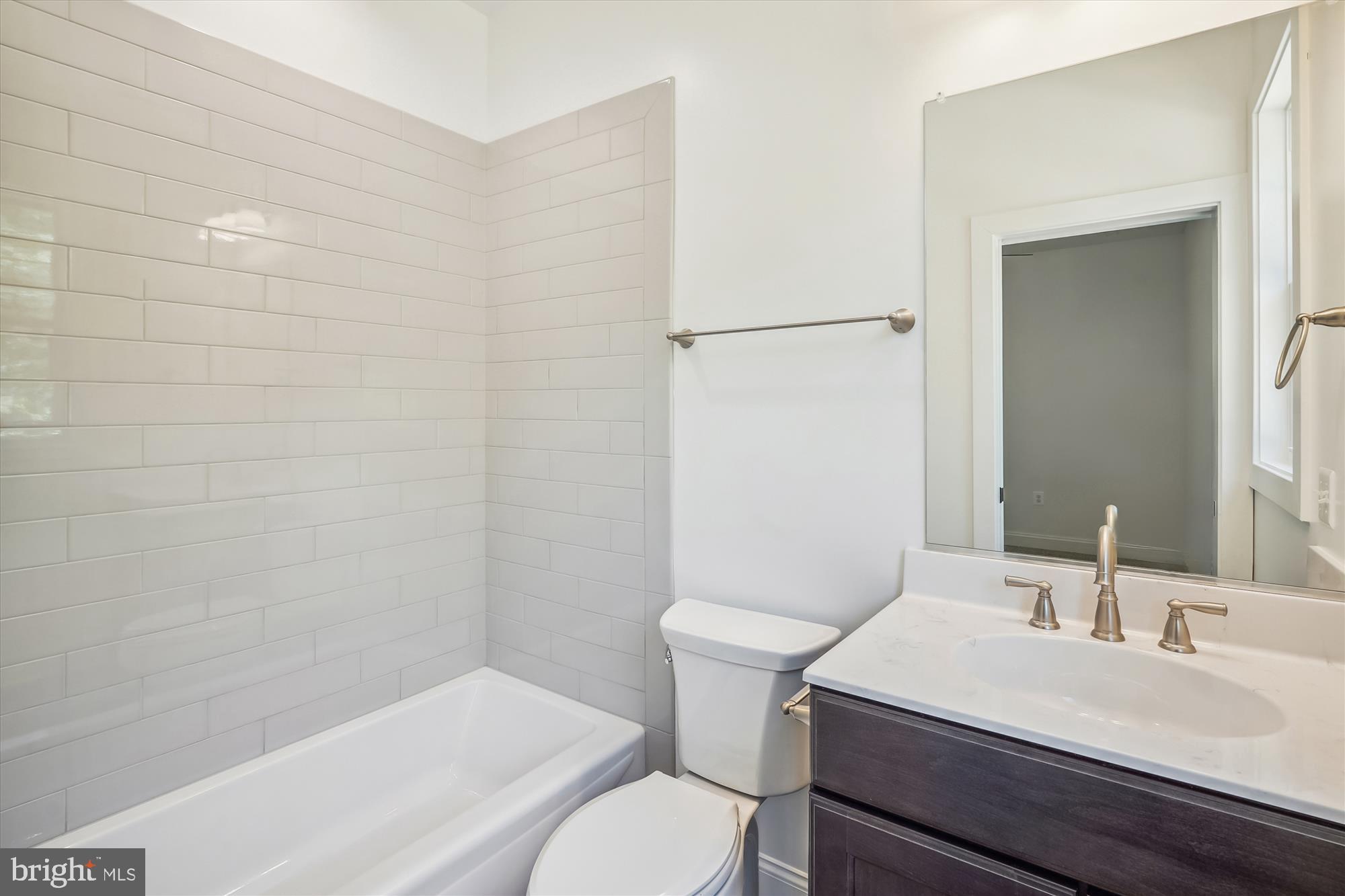 9336 Moses Place Culpeper, VA 22701 - Photo 43 of 50 a bathroom with a sink toilet and shower