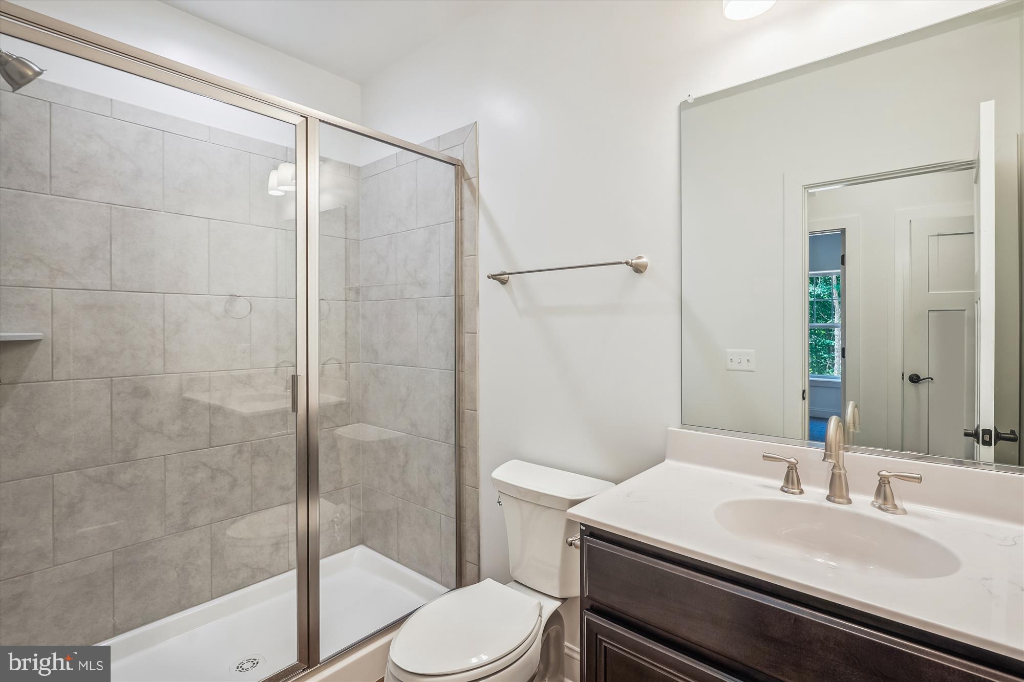 9336 Moses Place Culpeper, VA 22701 - Photo 48 of 50 a bathroom with a sink toilet and shower